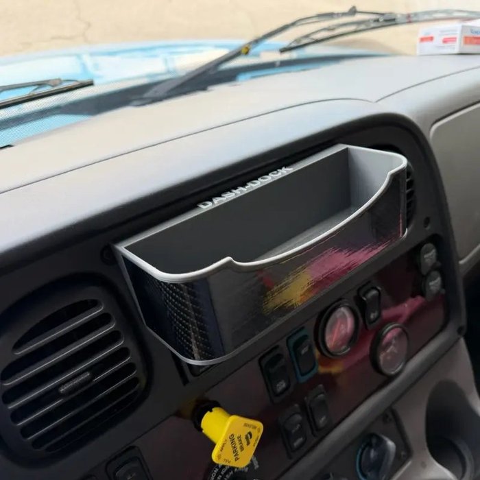 M2 106 Gray — Dash-Dock tray for Freightliner M2 106 · first-gen dash, pocket above stereo