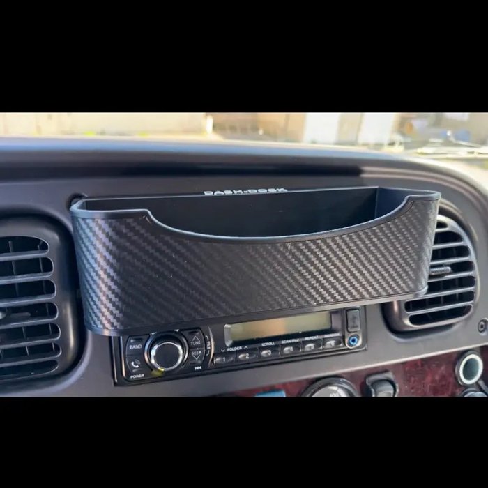 M2 106 — Dash-Dock tray for Freightliner M2 106 · first-gen dash, pocket above stereo