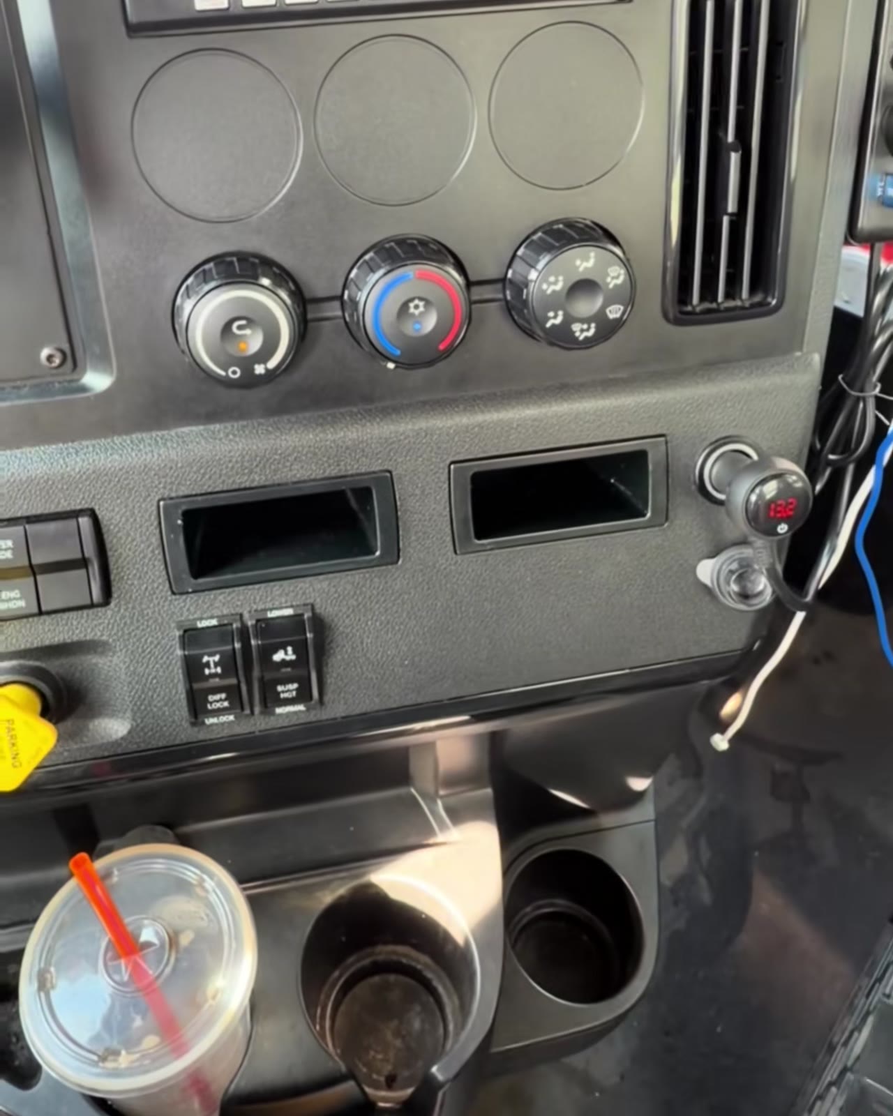 Empty factory dash slot in a Freightliner Cascadia