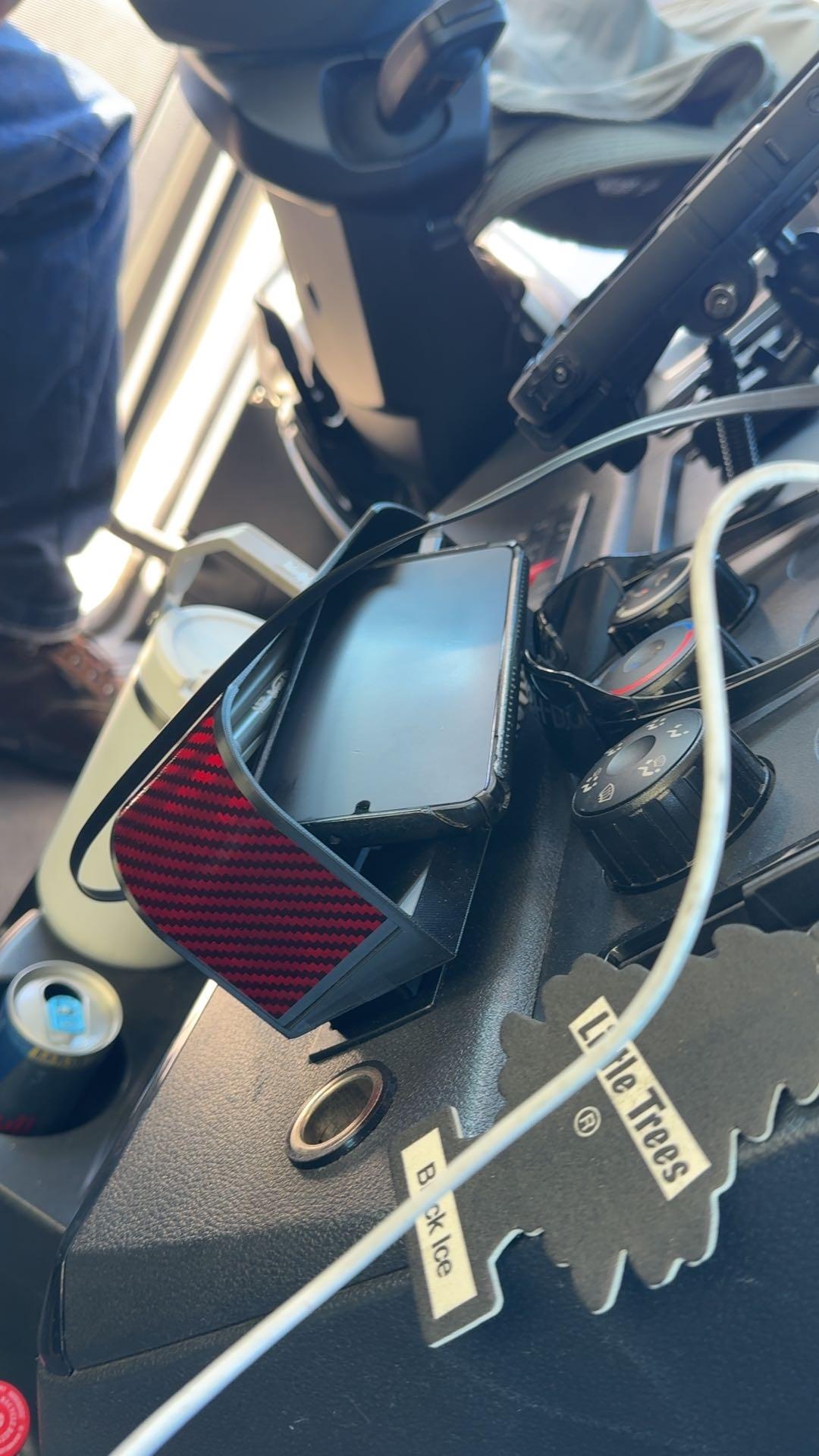 Customer photo of a red Dash-Dock tray in the dash